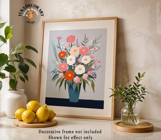a picture of a vase of flowers and lemons on a table