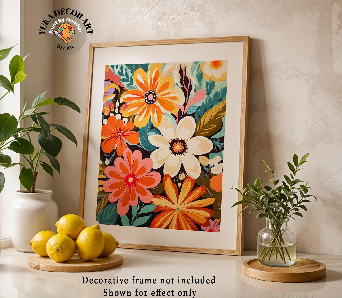 a picture of flowers and lemons on a table