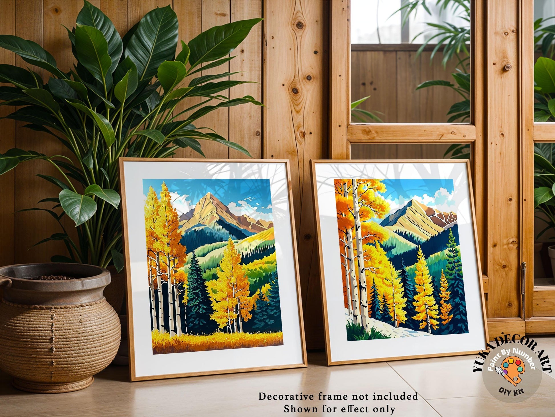 a couple of paintings sitting on top of a table