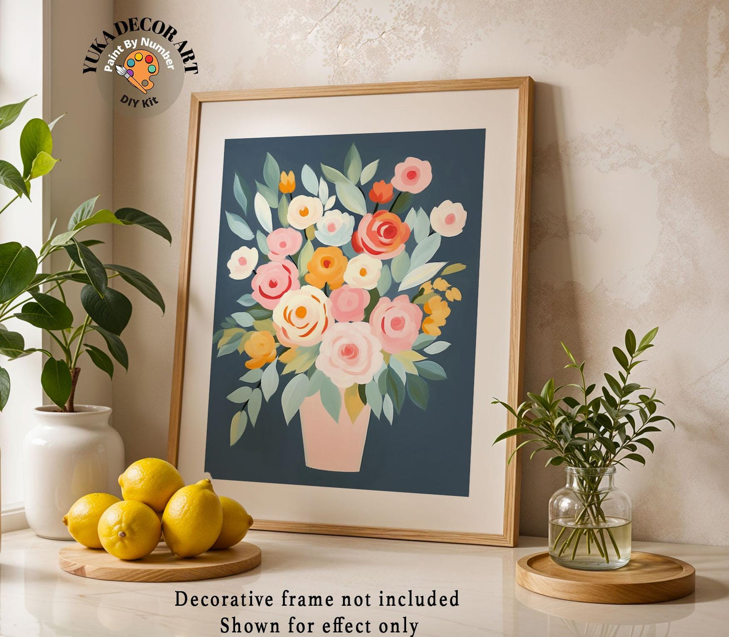 a picture of a vase of flowers and lemons on a table